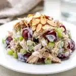 Creamy Greek yogurt chicken salad with red grapes almonds and celery