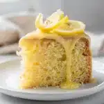 Moist lemon pound cake with creamy glaze and tender crumb close up