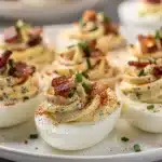 Classic bacon ranch deviled eggs with creamy filling and crispy bacon garnish