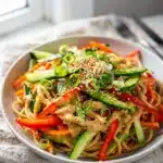 Cold sesame noodle salad with creamy tahini dressing and fresh vegetables