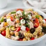 Creamy high protein Italian pasta salad with chicken and fresh vegetables.
