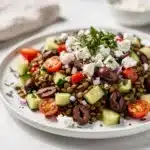 Crisp Mediterranean lentil salad with fresh vegetables and feta cheese