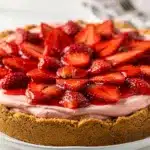 Old Fashioned No Bake Strawberry Pie slice with creamy filling and glazed berries.