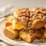 Overnight French toast bake with streusel topping and blueberries in maple syrup