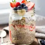 Make ahead high protein overnight oats in a jar with fresh berries and nuts
