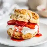 Homemade classic strawberry shortcake with fresh berries and whipped cream.