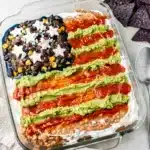 Patriotic layered taco dip recipe with vibrant salsa and creamy cheese layers