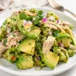Creamy avocado chicken salad recipe with fresh herbs and vibrant vegetables