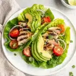 Cilantro lime grilled chicken lettuce wraps recipe with fresh avocado and vegetables