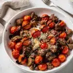 Italian Sausage and Cherry Tomato Skillet with basil and cheese.