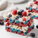 Red white blue Rice Krispie treats with fresh berries