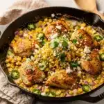 Creamy street corn chicken skillet with juicy chicken and charred corn