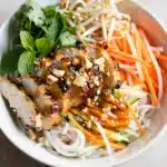 Vietnamese Vermicelli Bowl with grilled lemongrass chicken closeup