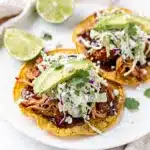 BBQ chicken tostada with creamy cilantro lime slaw close up