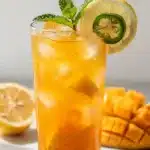 Refreshing mango jalapeño lemonade with mint and ice.