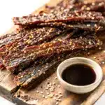 Teriyaki Turkey Jerky Strips with glossy caramelized glaze.